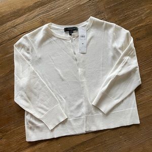 Womans Ann Taylor cropped cardigan in cream.